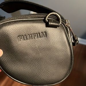 Fugi Film Camera Strap and Zip up carrying Bag (leather)